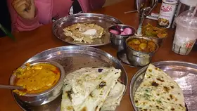 A thali with parathas and dal at a Murthal dhaba on the Delhi to Manali road
